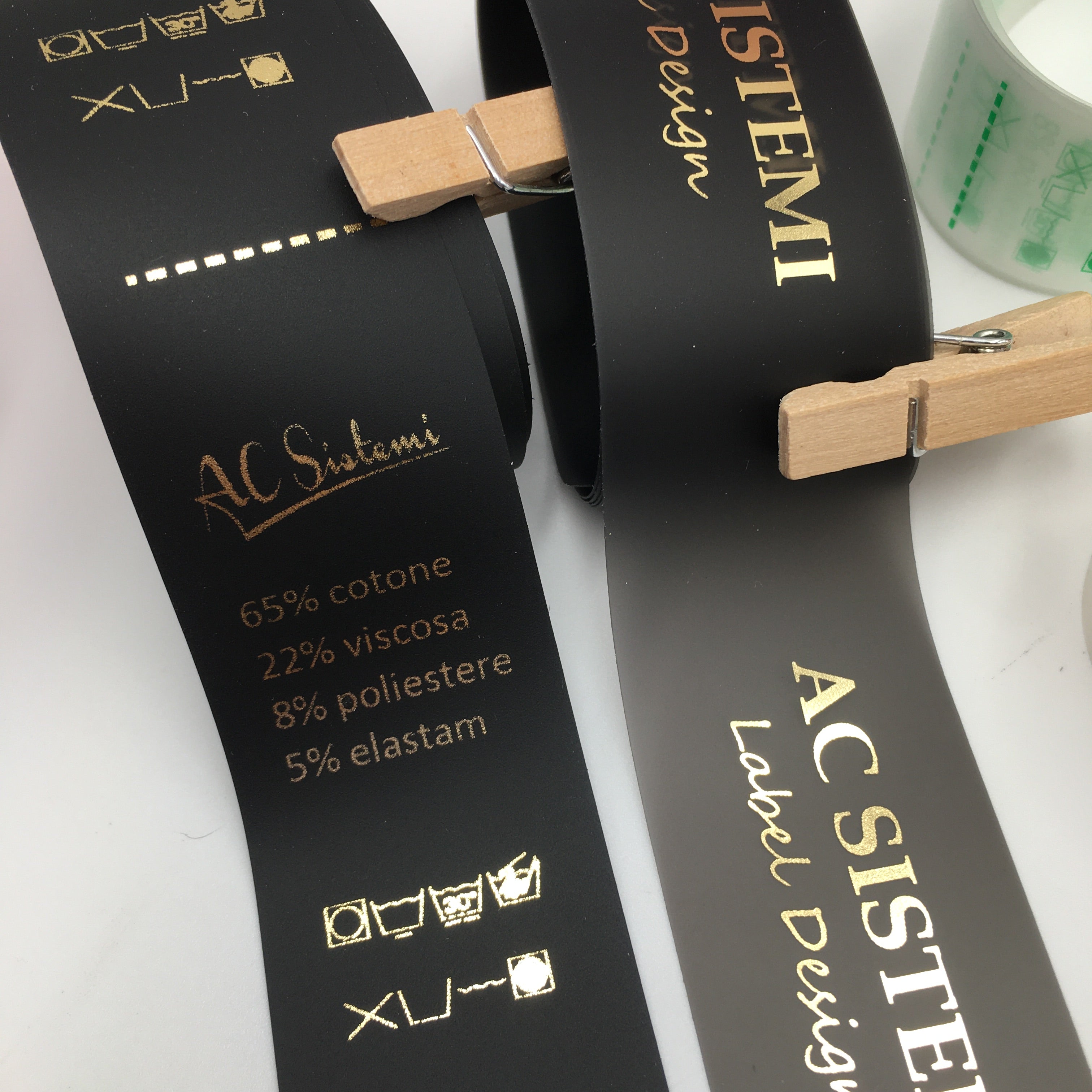 etichette per tessuti in tnt, raso e silicone